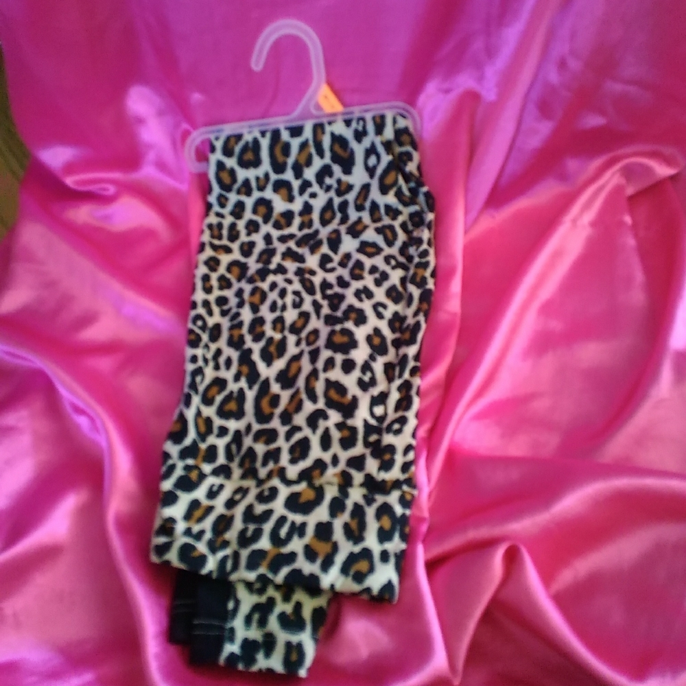 Leopard print pants with mesh paneling